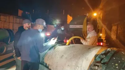 عملية تنظيف بمزرعة الشهيد مختيش عبد القادر بموزاية، الصورة: ح.م.